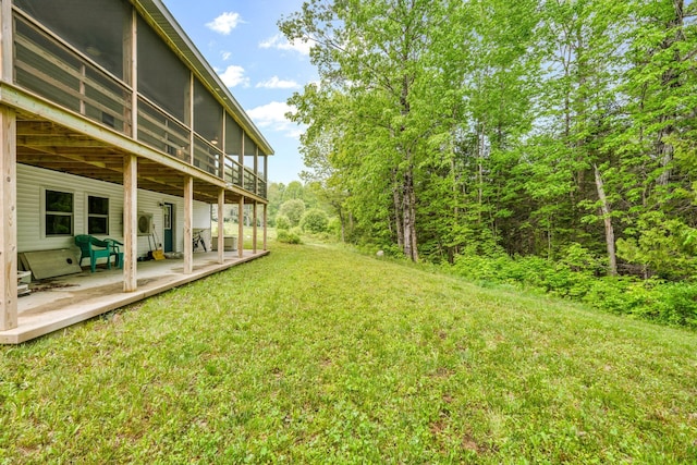 612 Airline Rd, Amherst, ME 04605 - view of grassy yard featuring a patio