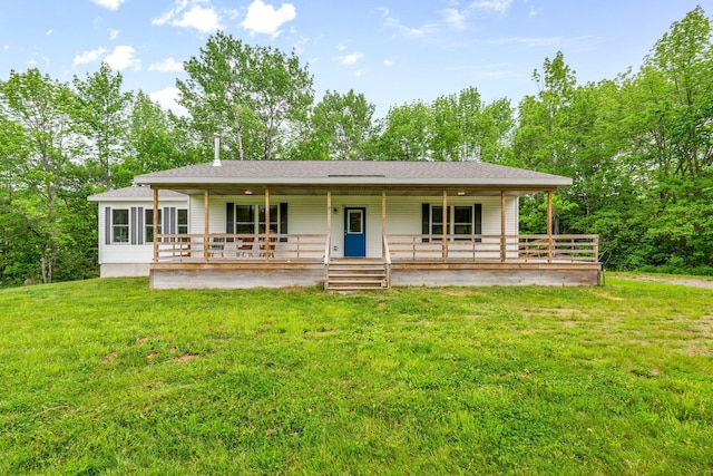 612 Airline Rd, Amherst, ME 04605 - view of front of home with a front lawn, a porch, and a shingled roof