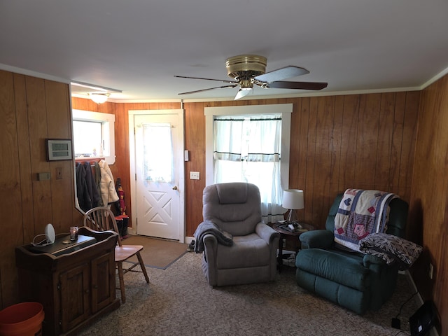 18 Cedar Ln, Belfast, ME 04915 - carpeted living area with wood walls and ceiling fan