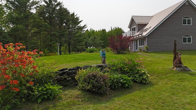 55 Pember Rd, Levant, ME 04456 - view of green lawn featuring a balcony