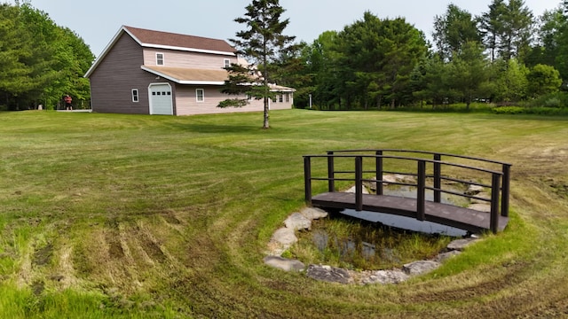 55 Pember Rd, Levant, ME 04456 - view of green lawn featuring a garage
