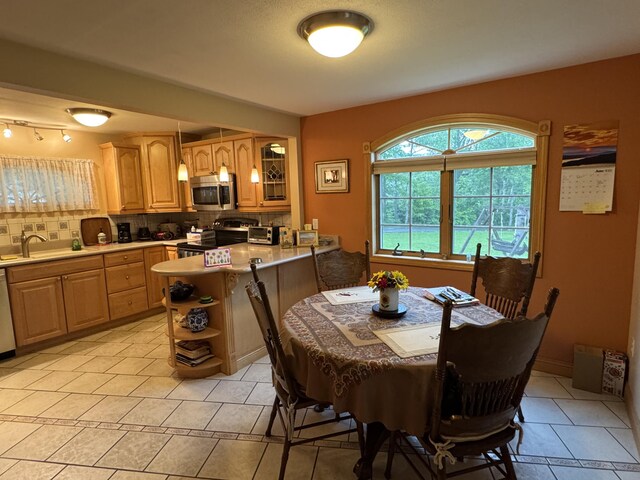 55 Pember Rd, Levant, ME 04456 - dining space featuring light tile patterned floors