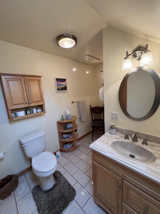 55 Pember Rd, Levant, ME 04456 - bathroom featuring vanity, toilet, and tile patterned floors