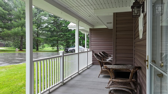 55 Pember Rd, Levant, ME 04456 - porch featuring a water view and a lawn