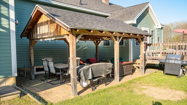815 Grant Rd, Corinth, ME 04427 - view of patio with a gazebo, a grill, and a wooden deck