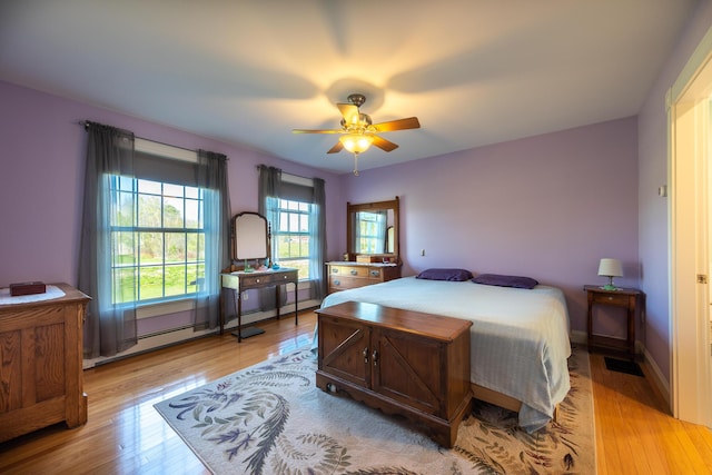 815 Grant Rd, Corinth, ME 04427 - bedroom featuring light wood-type flooring and a ceiling fan