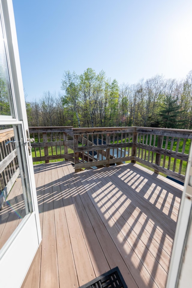 815 Grant Rd, Corinth, ME 04427 - wooden terrace with view of scattered trees