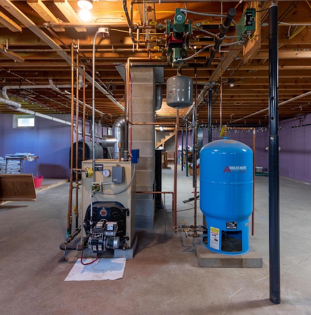 815 Grant Rd, Corinth, ME 04427 - utility room with heating fuel and a heating unit