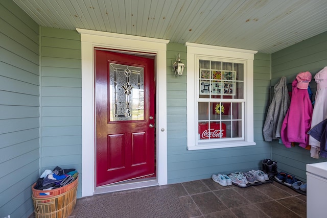 815 Grant Rd, Corinth, ME 04427 - property entrance featuring a porch