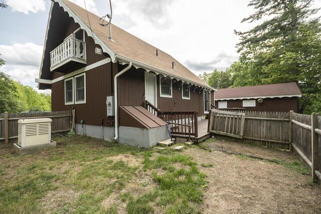 37 Hubbard Rd, Berwick, ME 03901 - rear view of property with a fenced backyard, a deck, roof with shingles, and a balcony