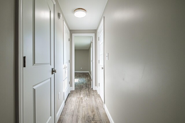 58 Pequawket Trl, Baldwin, ME 04024 - hallway featuring light wood-type flooring and baseboards
