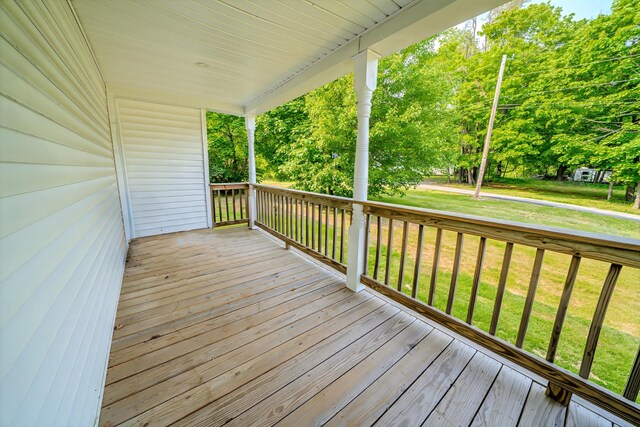 304 Main Rd N, Hampden, ME 04444 - porch with a yard and view of scattered trees