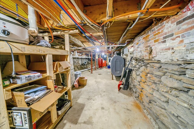 304 Main Rd N, Hampden, ME 04444 - unfinished basement with oil tank and water heater