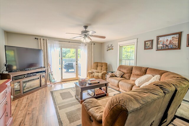 304 Main Rd N, Hampden, ME 04444 - living room with a ceiling fan and light wood finished floors