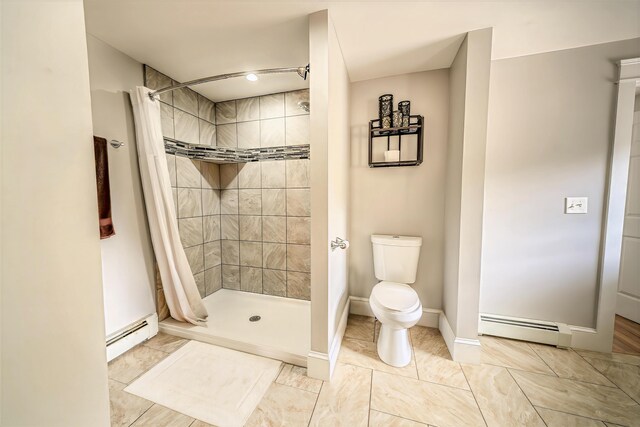 304 Main Rd N, Hampden, ME 04444 - full bath with a baseboard heating unit, toilet, and a shower stall