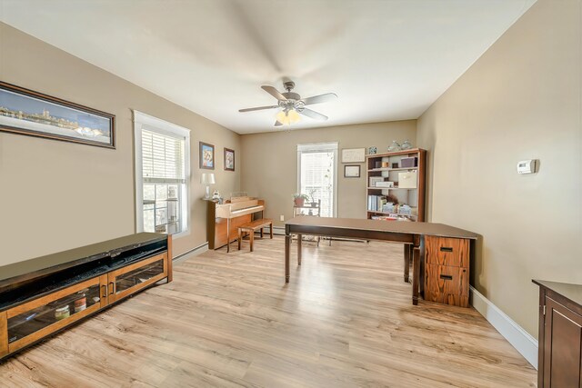 304 Main Rd N, Hampden, ME 04444 - home office with ceiling fan, light wood-style flooring, and baseboards