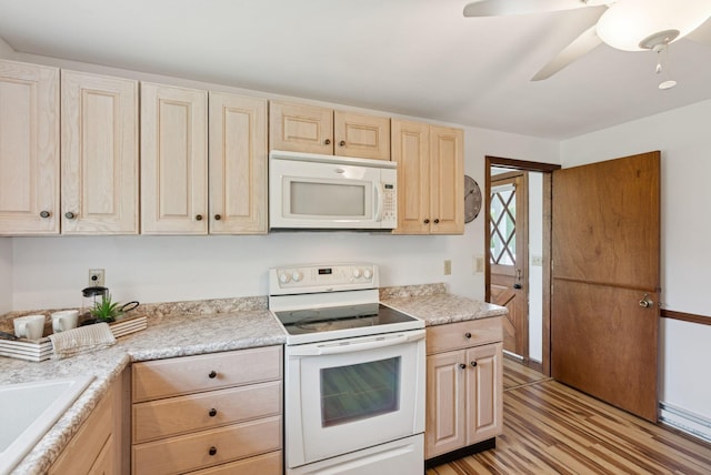 16 Marsh View Ave, Kennebunk, ME 04043 - kitchen featuring white appliances, light brown cabinets, light countertops, and light wood-style flooring