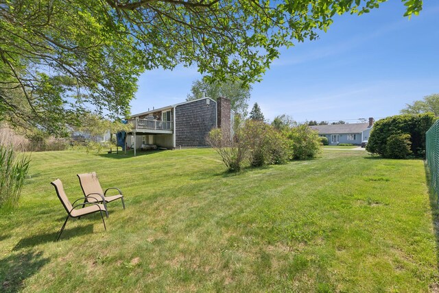16 Marsh View Ave, Kennebunk, ME 04043 - view of grassy yard featuring a wooden deck
