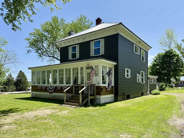88 Union St, Calais, ME 04619 - view of front of house with a chimney and a front yard