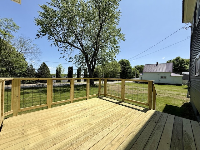 88 Union St, Calais, ME 04619 - wooden terrace with a lawn