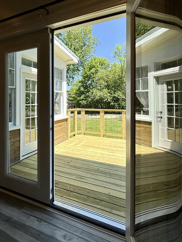 88 Union St, Calais, ME 04619 - doorway to outside featuring wood finished floors and healthy amount of natural light