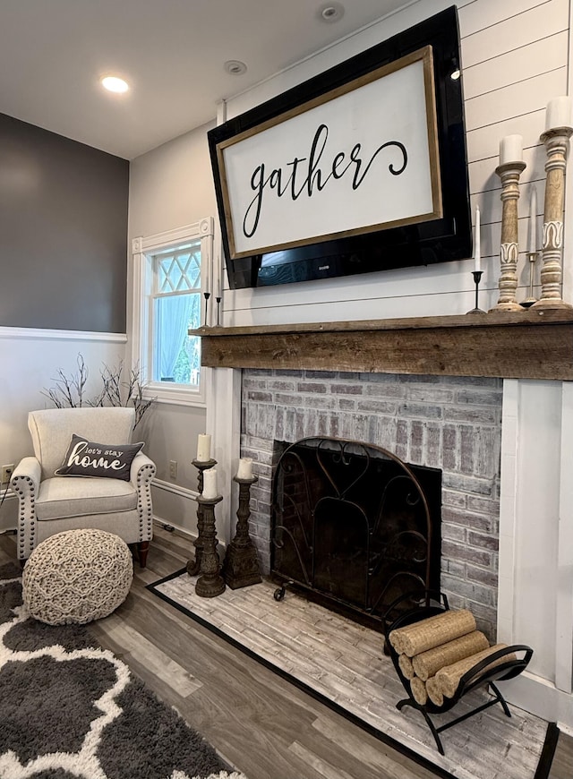 88 Union St, Calais, ME 04619 - detailed view of wood finished floors and a brick fireplace