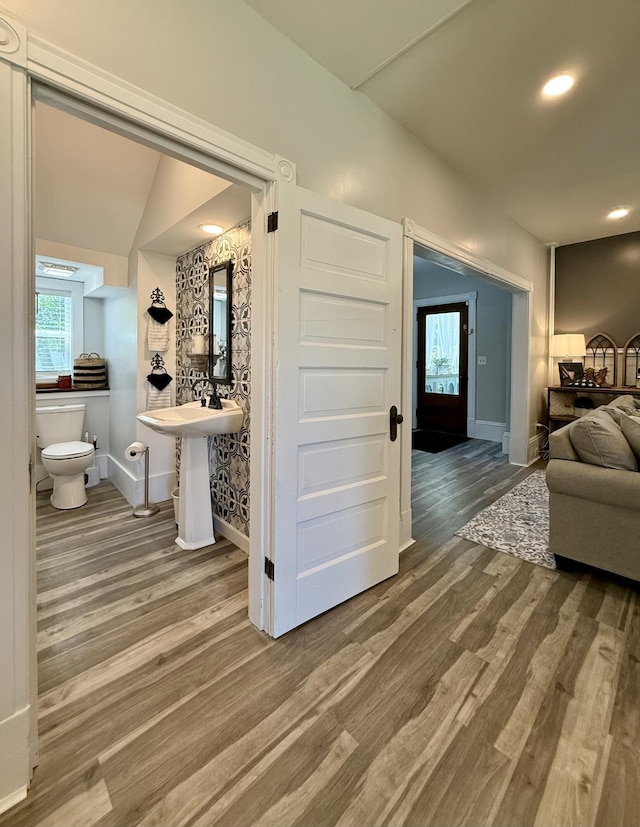 88 Union St, Calais, ME 04619 - hallway with wood finished floors, baseboards, and recessed lighting