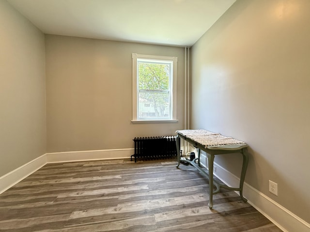 88 Union St, Calais, ME 04619 - office featuring radiator, wood finished floors, and baseboards
