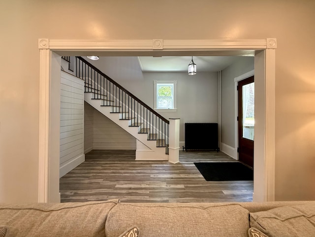 88 Union St, Calais, ME 04619 - foyer entrance featuring wood finished floors, stairs, and baseboards
