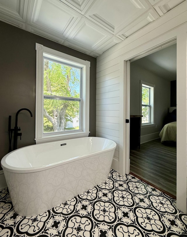 88 Union St, Calais, ME 04619 - bathroom with a freestanding tub and coffered ceiling