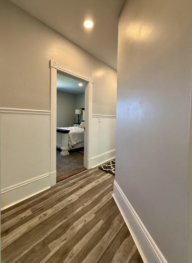 88 Union St, Calais, ME 04619 - hallway featuring wood finished floors, baseboards, and recessed lighting