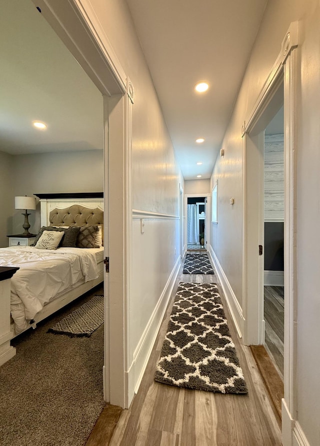 88 Union St, Calais, ME 04619 - hall with wood finished floors, recessed lighting, and baseboards