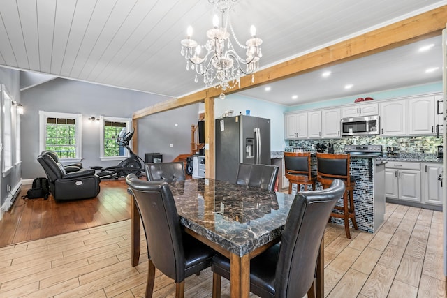 55 Mountain View Ext, Rockland, ME 04841 - dining area with a chandelier, light wood-style floors, and wooden ceiling