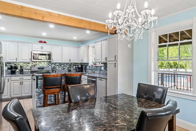55 Mountain View Ext, Rockland, ME 04841 - dining room with a chandelier, crown molding, recessed lighting, and baseboards