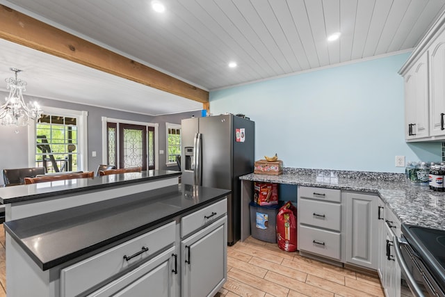 55 Mountain View Ext, Rockland, ME 04841 - kitchen with appliances with stainless steel finishes, recessed lighting, a chandelier, wood finish floors, and a center island