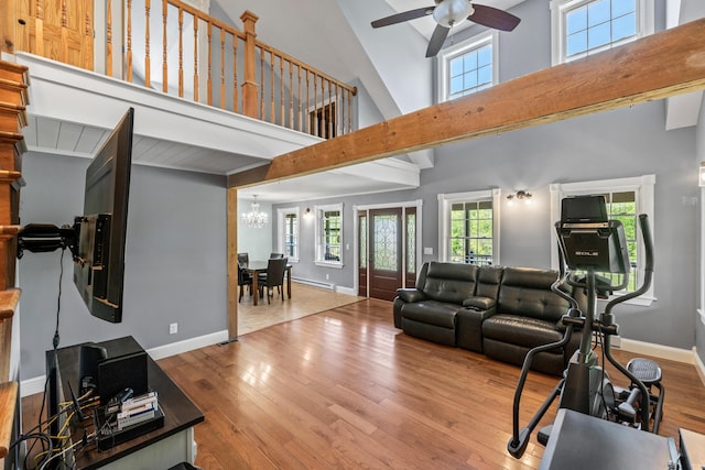 55 Mountain View Ext, Rockland, ME 04841 - living area featuring high vaulted ceiling, a ceiling fan, wood finished floors, and plenty of natural light