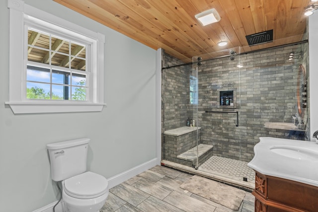 55 Mountain View Ext, Rockland, ME 04841 - bathroom featuring vanity, a shower stall, baseboards, toilet, and wooden ceiling