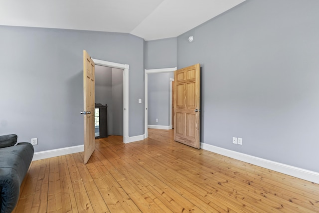 55 Mountain View Ext, Rockland, ME 04841 - sitting room with lofted ceiling, light wood finished floors, and baseboards