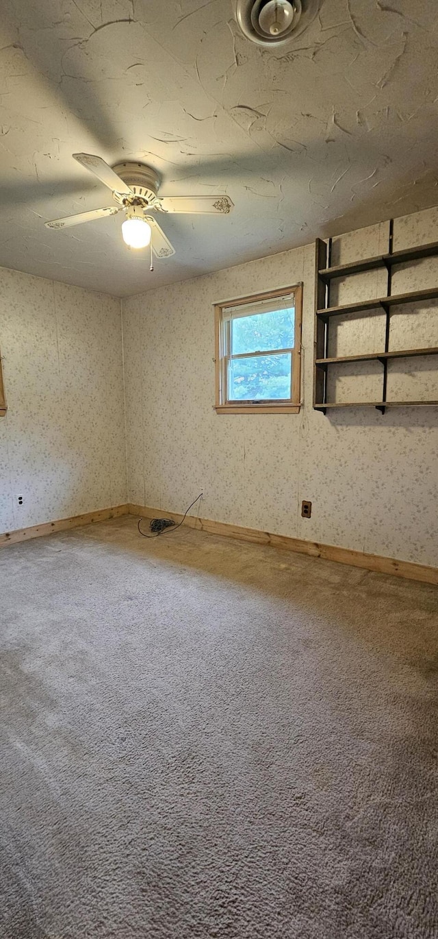 20 Oosoola St, Norridgewock, ME 04957 - carpeted empty room with baseboards and ceiling fan