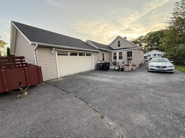 43 Rosedale St, Lewiston, ME 04240 - view of front of house featuring driveway, a garage, and a shingled roof