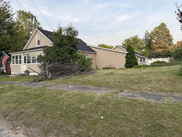 43 Rosedale St, Lewiston, ME 04240 - view of side of property with a lawn