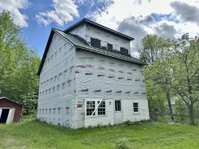 265 Grove St, Newport, ME 04953 - view of side of property with metal roof