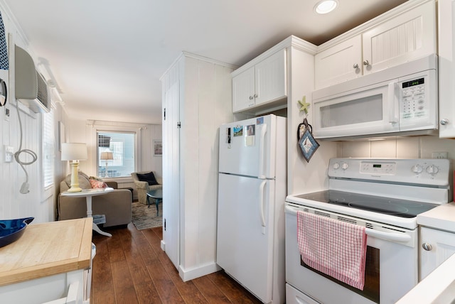 14 Larrys Ldg Unit 14, Ogunquit, ME 03907 - kitchen with white appliances, dark wood-style flooring, white cabinets, wood counters, and an AC wall unit