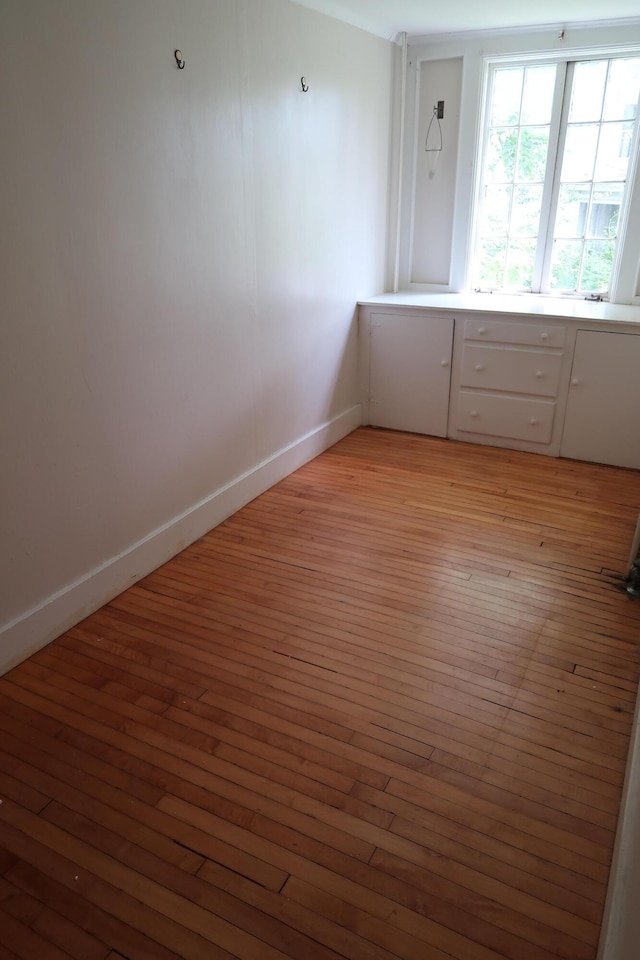 7 Elm St, Augusta, ME 04330 - empty room with light wood-type flooring and baseboards