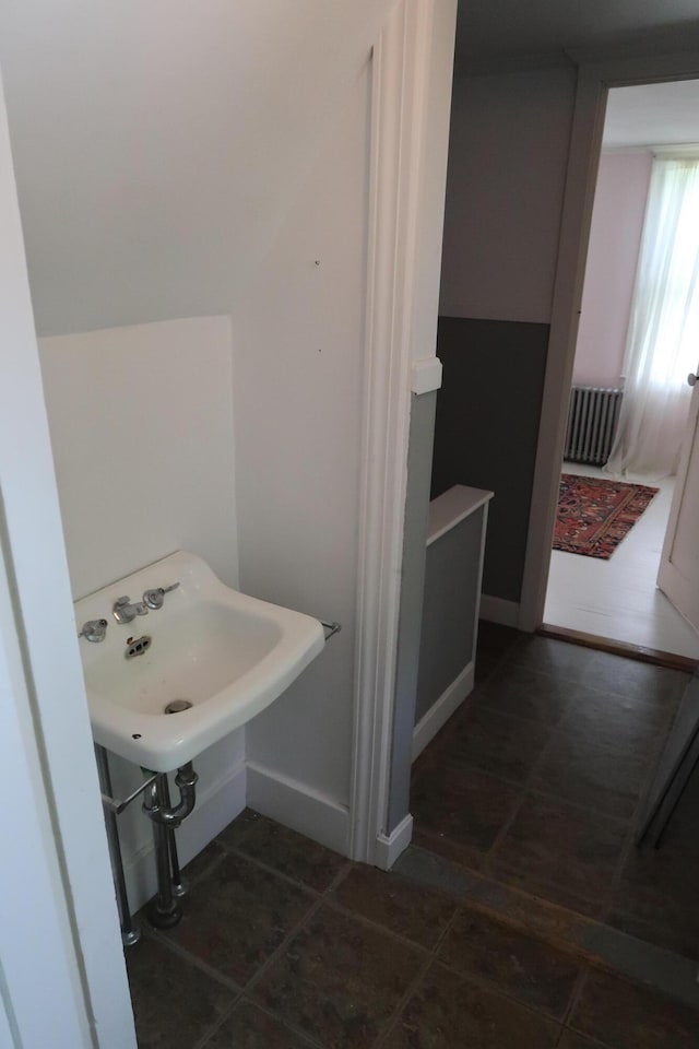7 Elm St, Augusta, ME 04330 - bathroom with tile patterned floors and radiator heating unit