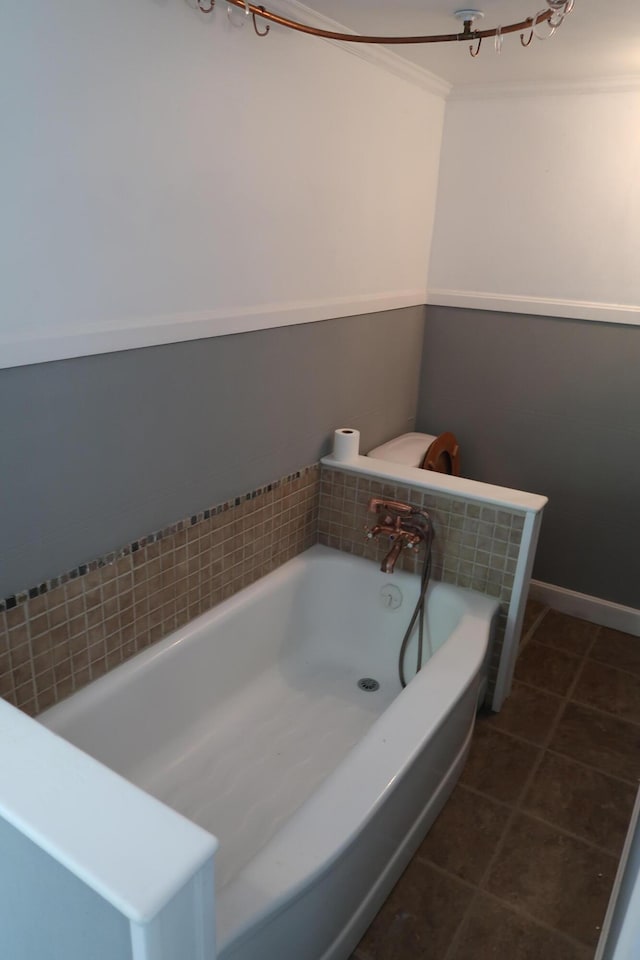 7 Elm St, Augusta, ME 04330 - bathroom with a garden tub, tile patterned flooring, and ornamental molding