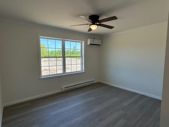 144 Curtis St, Pittsfield, ME 04967 - empty room with baseboard heating, a wall unit AC, crown molding, a ceiling fan, and dark wood-style flooring