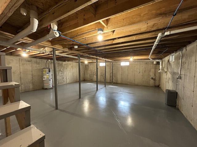 144 Curtis St, Pittsfield, ME 04967 - unfinished basement with water heater