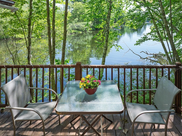 66 Myron Hall Rd, Raymond, ME 04071 - wooden deck featuring a water view and outdoor dining area