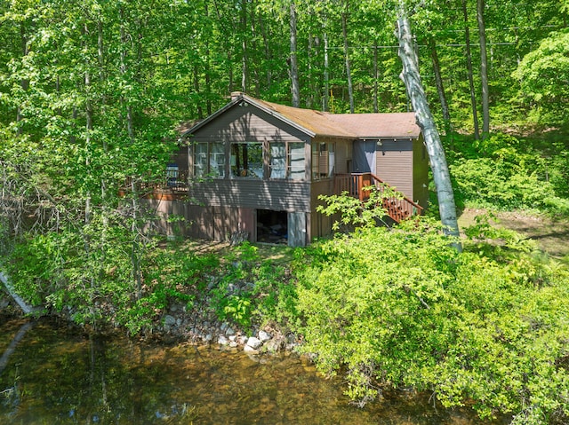 66 Myron Hall Rd, Raymond, ME 04071 - view of home's exterior with a deck and a forest view